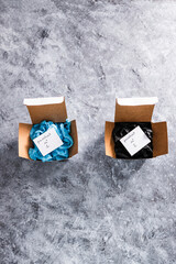 online delivery parcel boxes with Product 1 and 2 on tags with different colors, competitions and...