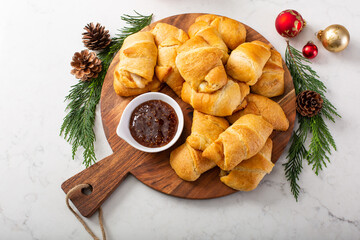 Christmas appetizers, fig jam filled crescent rolls © fahrwasser