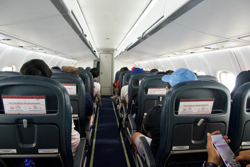 An inside view of a passenger plane, aircraft during flight 