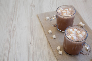 Homemade Hot Chocolate with Mini Marshmallows, side view. Copy space.