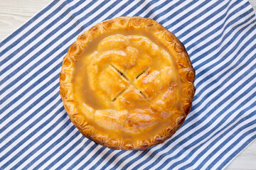 Fresh Homemade Salted Caramel Apple Pie, top view. Flat lay, overhead, from above.