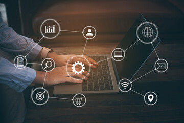 Woman hand working digital marketing media in virtual screen with mobile phone and modern computer with VR icon diagram at office