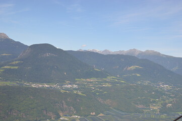 View to the village Prissian in Southtyrol mountains behind 