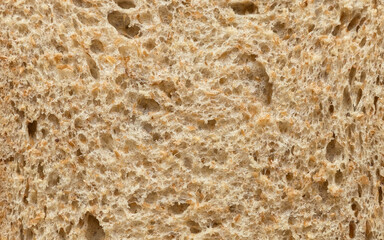 A close up of wholemeal bread background and texture.