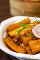 An appetizing cold dish, pickled radish in sauce