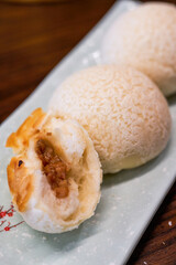 A plate of delicious Cantonese-style morning tea snacks, char siu crispy meal bread