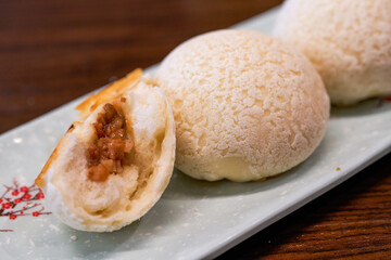 A plate of delicious Cantonese-style morning tea snacks, char siu crispy meal bread