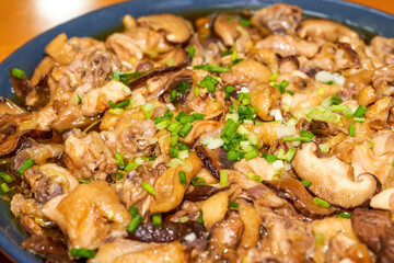 A delicious steamed chicken with shiitake mushrooms