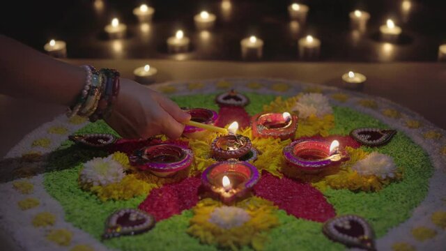 Diwali is a festival of lights celebrations by Hindus , Jains, Sikhs and some Buddhists