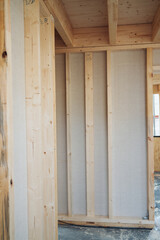 Interior wooden clad walls in place in a new build house