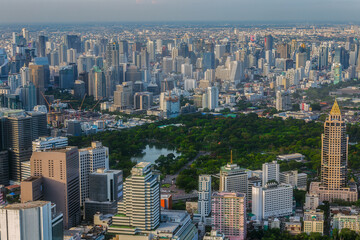 Obraz premium Aerial view of ฺBangkok or junction with cars traffic skyscraper buildings. Bangkok City in downtown at night, Thailand. 