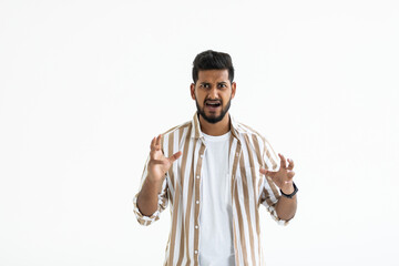 Indian rage man accuses someone in a quarrel. Isolated on white background. - obrazy, fototapety, plakaty