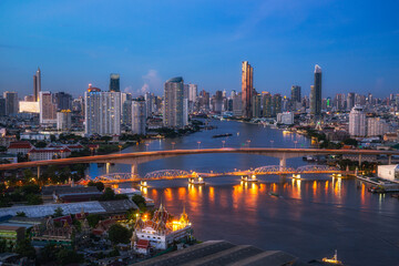 Aerial view of Bangkok City skyline by Chao Phraya River in Thailand
