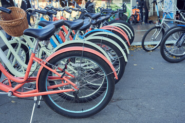 Fototapeta na wymiar Bicycles for rent on the street, rental vehicle