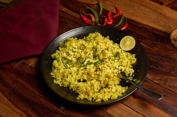 Traditional Indian breakfast made from flattened rice which happens to be a speciality of Pune in Maharashtra India.