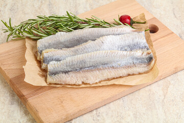 Obraz na płótnie Canvas Salted herring fillet appetizer snack
