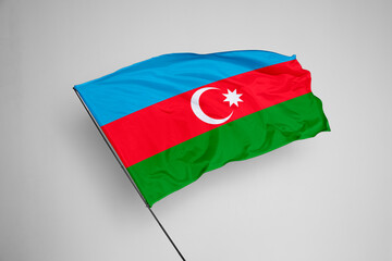 Azerbaijan flag isolated on white background. close up waving flag of Azerbaijan. flag symbols of Azerbaijan. Concept of Azerbaijan.