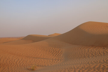 Fototapeta na wymiar Sunset in Dubai desert