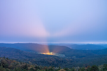 lights of a f arm illuminating the clouds