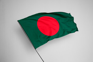 Bangladesh flag isolated on white background. close up waving flag of Bangladesh. flag symbols of Bangladesh. Concept of Bangladesh.