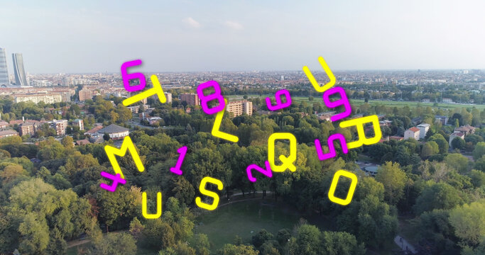 Image of falling numbers and letters over cityscape