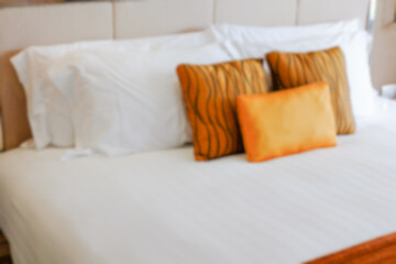 blur pillows on bed and in bedroom
