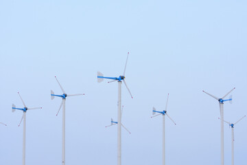 wind turbine on blue sky background