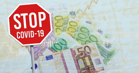 Stop covid 19 signboard and financial data processing against euro bills