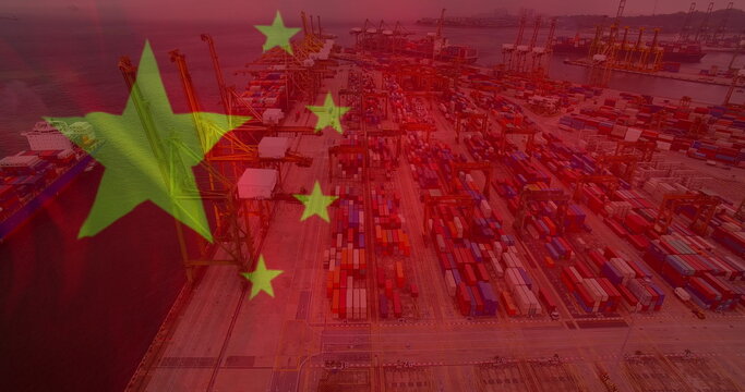 Image of chinese flag flowing over busy port