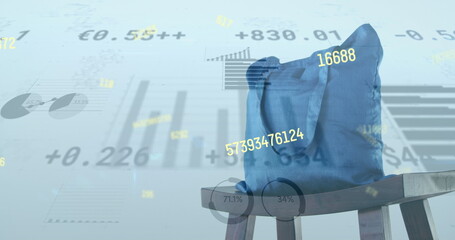 Image of numbers changing and data processing over blue shopping bag