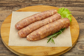 Raw pork meat sausages for grill