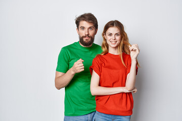 Fototapeta premium married couple hug friendship colorful t-shirts family isolated background