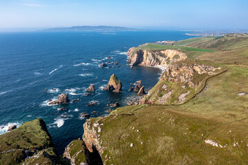 Obraz premium Aerial view of the rocks in the sea at Crohy Head Sea Arch, County Donegal - Ireland.