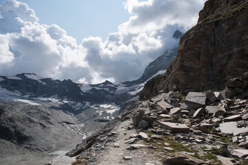 view on the alpine hiking trail to the “Hörnlihütte” hoernli cottage, near zermatt in switzerland, the hut is at the foot of the matterhorn.