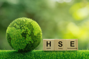 Concept of HSE Health Safety Environment Education Industry.words HSE on a woodblock It is an idea for health safety environment for business and organization. 