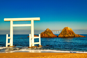 White Torii and married woman in Noshimaura, Itoshima Prefecture, Fukuoka Prefecture