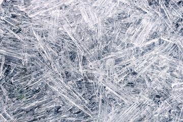 background of needle-shaped ice pieces. needle ice near the reservoir