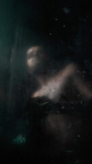 Reflection of a naked guy in the black tile