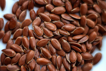 Flax seeds are scattered on the table