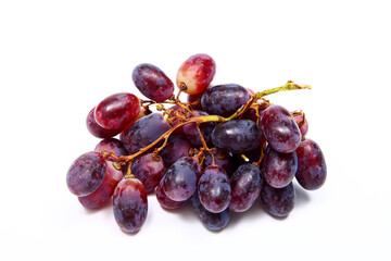 Bunch of juicy ripe black grapes isolated on a white background