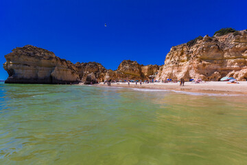 Fototapeta premium Aerial view of Praia dos Tres Irmaos beach, Alvor, Algarve, Portugal