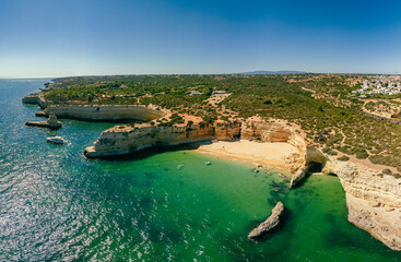 Aerial drone panoramic views of Praia Nova and Praia de Nossa, Algarve, Portugal