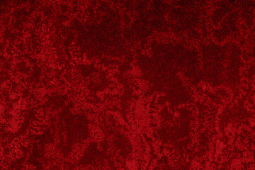 texture de fond graphique de sol coloré rouge, bordeaux,  en extérieur, monde du luxe, haut de gamme, noël