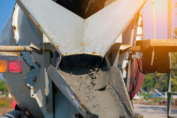 Concrete mixer truck. Close-up of stationary tank for transporting