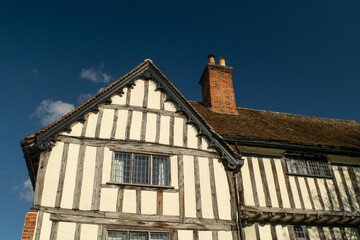Facade of old Tudor timber framed cottage house at Saffron Walden, England
