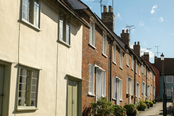 Fototapeta na wymiar Facade of British terraced brick houses at Saffron Walden, England