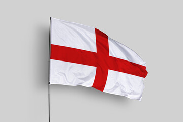 Obraz premium England flag isolated on the blue sky background. close up waving flag of England. flag symbols of England. Concept of England.