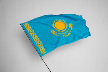 Kazakhstan flag isolated on white background. close up waving flag of Kazakhstan. flag symbols of...