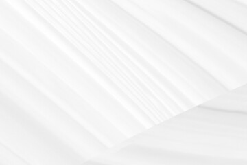 Fototapeta premium Clean woven beautiful soft fabric abstract smooth curve shape decorative fashion textile silver white background