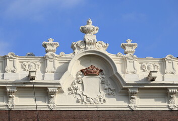 Amsterdam Keizersgracht Canal House Sculpted Facade Top with Crown Close Up, Netherlands.